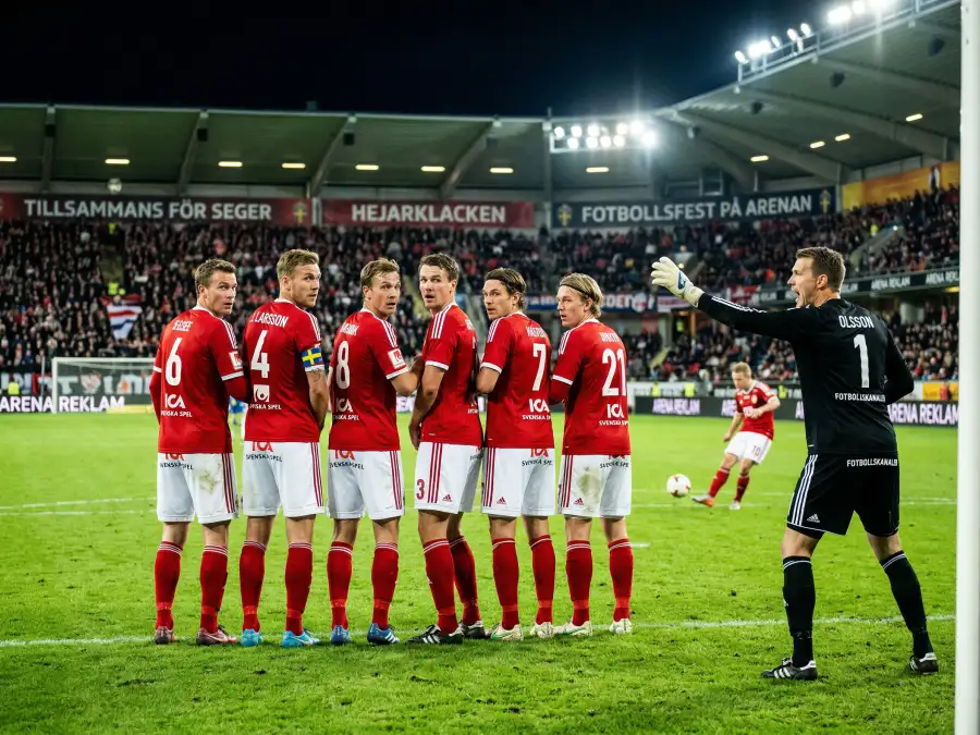 Tunisiens landslag i röda tröjor under en afrikansk kvalmatch